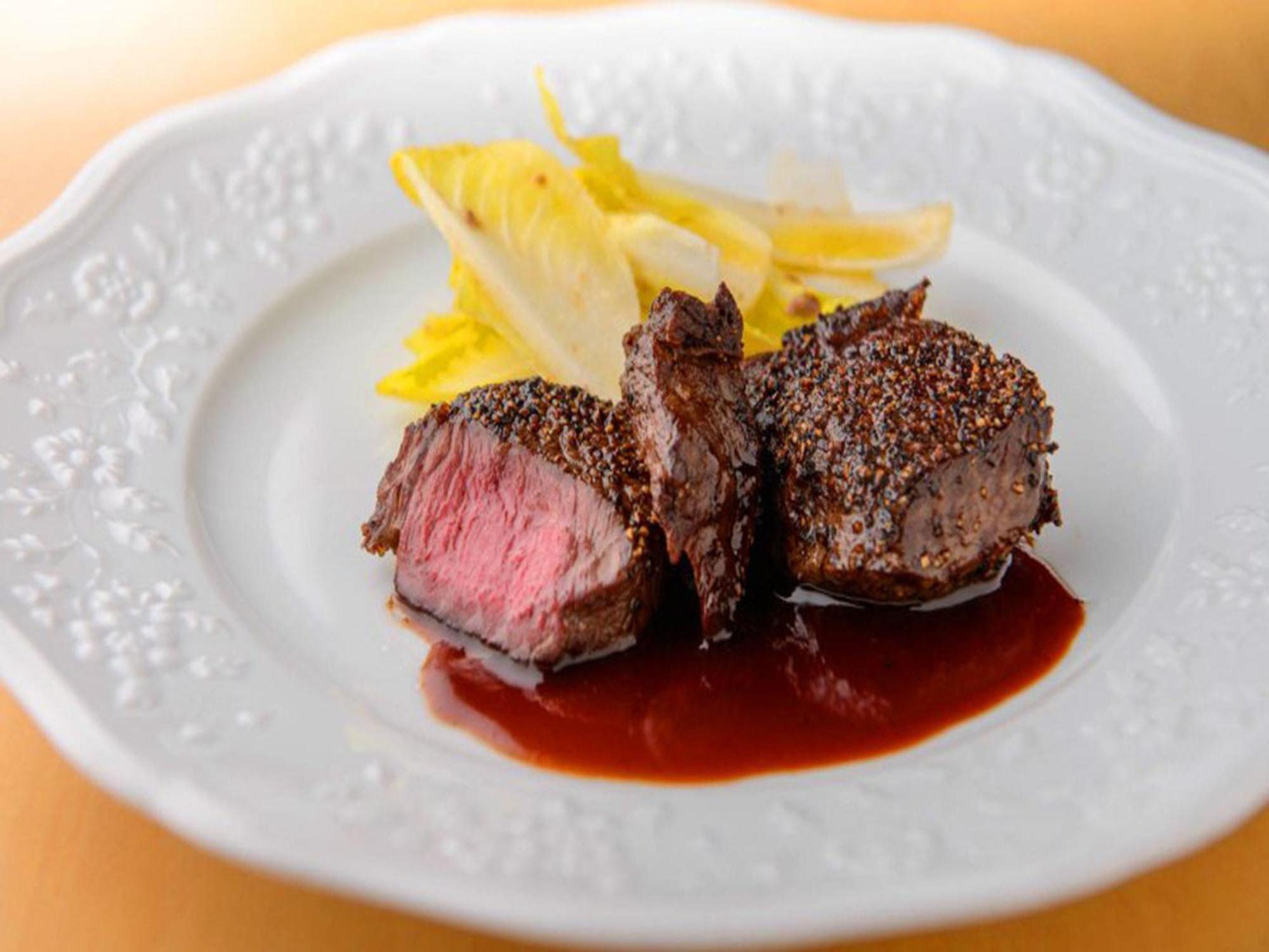Shin Furano Prince Hotel Экстерьер фото A steak prepared using the dry-aging technique